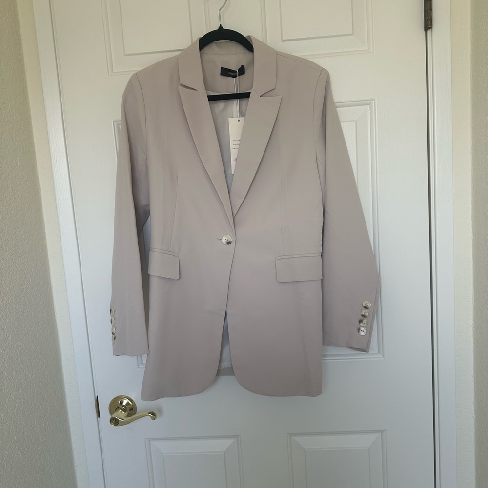 Chic Beige Blazer With Button Details - image 1